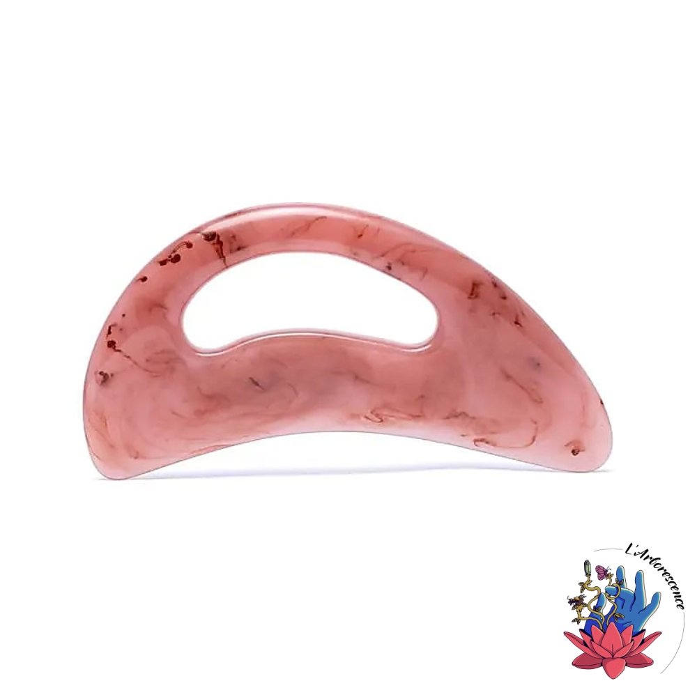 Le Gua Sha de Massage en Résine pour Tout le Corps, avec son design en forme de croissant et son apparence inspirée du quartz rose, est un outil essentiel pour les massothérapeutes et les amateurs de soins. Conçu pour s’adapter à toutes les parties du corps, il améliore la circulation sanguine, soulage les tensions musculaires, et favorise la santé globale de la peau. Durable, léger et ergonomique, il offre une prise facile grâce à sa grande poignée centrale, permettant une application précise et efficace.